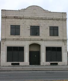 1105 Broadway: Built in 1927 as a store and office building for Dr. John Nowak, who had his optometrist offices on the 2nd floor. The orginial medical function of the building is reflected by two caducei in the terra cotta facade.