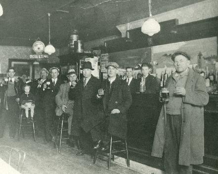 Adam's Tavern, Buffalo, New York, 1933. The regulars returned to Adam's Tavern, 1012 Sycamore (at Loepere) to hoist some brews and, it would appear, a shot or two as well shortly after the repeal of Prohibition in 1933. Adam Pilarz, proprietor, stands behind the bar along side his son John. The family ran the tavern from 1924 until 1949. Thank you to Ed Pilarz for sharing this priceless family picture.