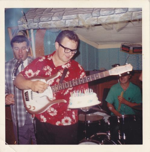 Eddie Blazonczyk receives a cake as Marion Lush sings Happy Birthday.