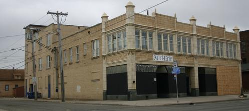 1129-1131 Broadway: This building stands out for tis terracotta and brick facade. Built for stores and professional offices for Sylvester A. Dzimian, a wallpaper dealer. Constructed in 1930.