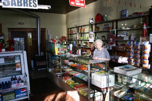 Business is slow nowadays says the 90 year old owner. Candy, pop and the Buffalo News are the biggest sellers.