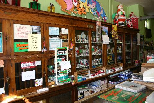 Smokes, greeting cards, playing cards, pipe cleaners and school tablets are still offered for sale. 