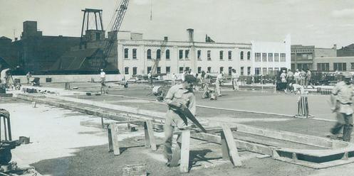 1956 construction photo of Market shows upper floors of Gibson Street buildings. Most of these structures were demo'd for parking in the 90s.